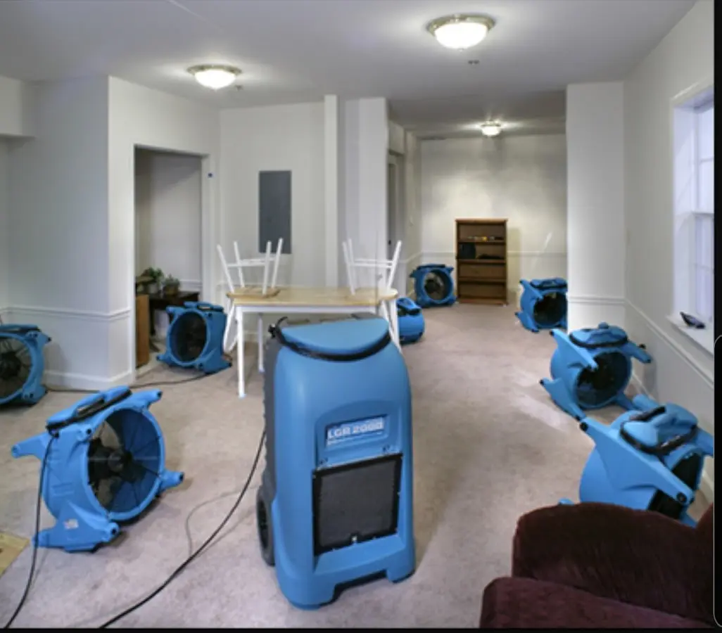 Air movers and dehumidifier setup for Water Extraction & Removal in Green